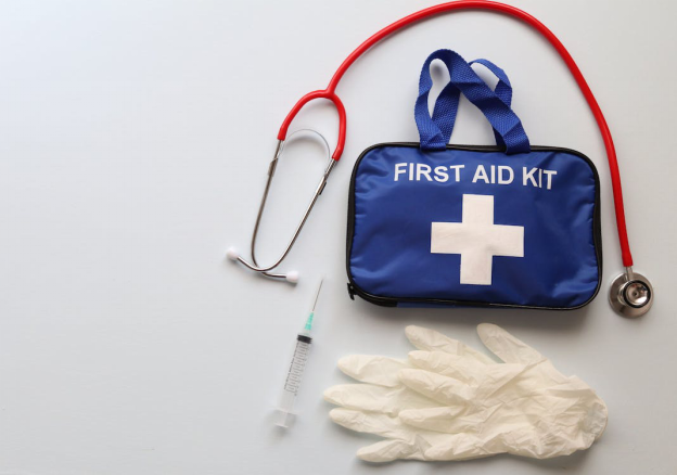 A first aid kit bag placed on a white background. 