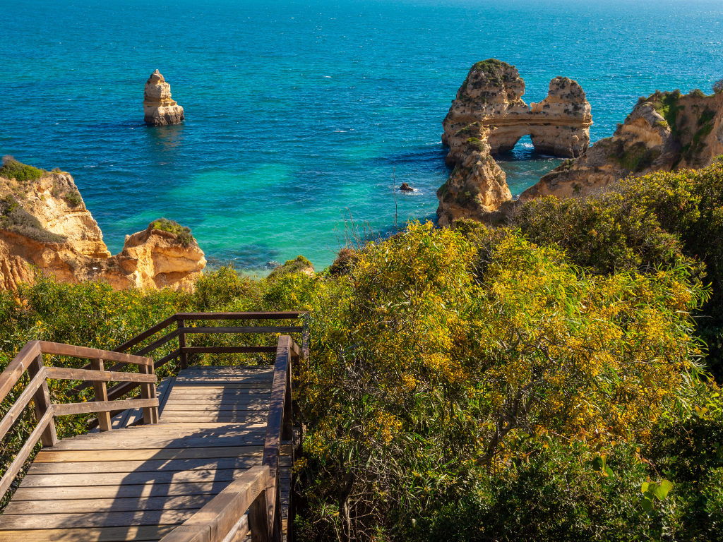 Why do tourist love to visit Lagos portugal?